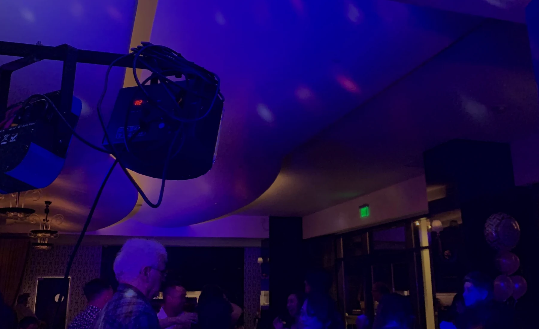 Guests enjoying a colorful event atmosphere